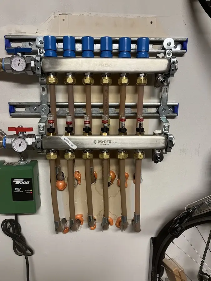 Plumber performing Water Heater Repair at a residential property in Black Mountain